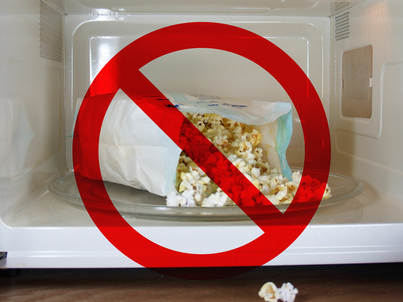 Bag of microwave popcorn with a slash going through it