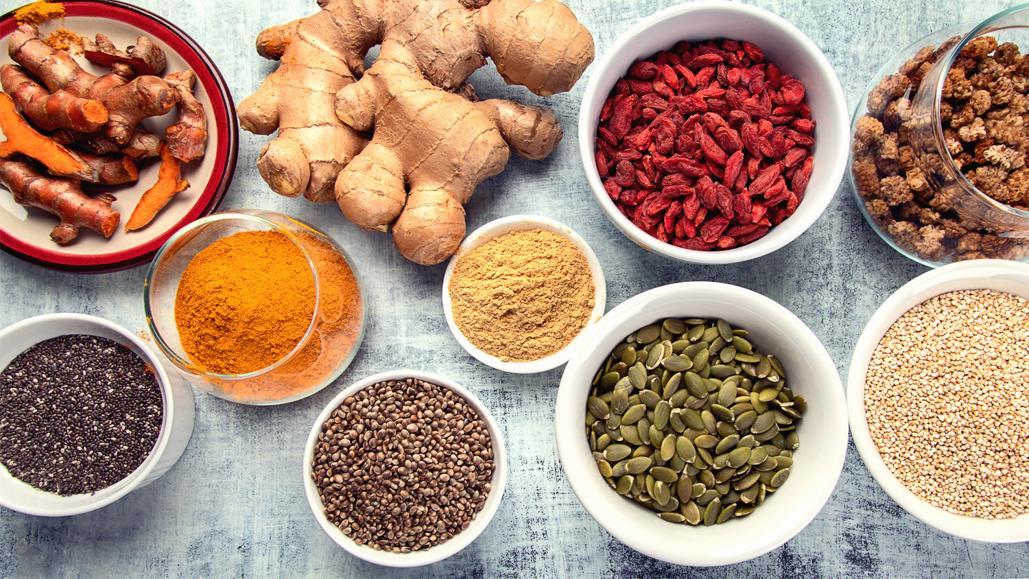 bowls with spices, grains, and seeds