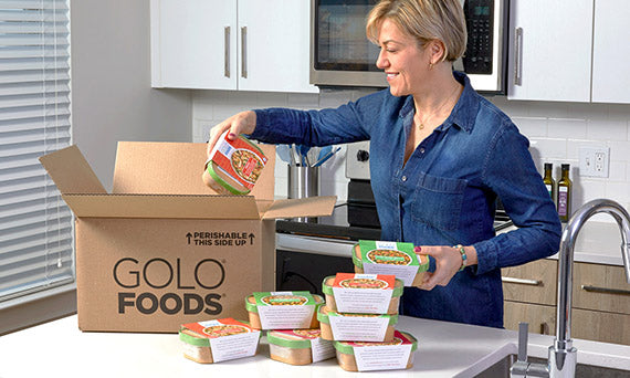 Woman unboxing golo foods