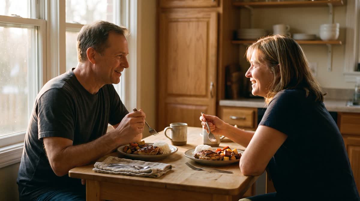 Two people eating an ordinary dinner together at home