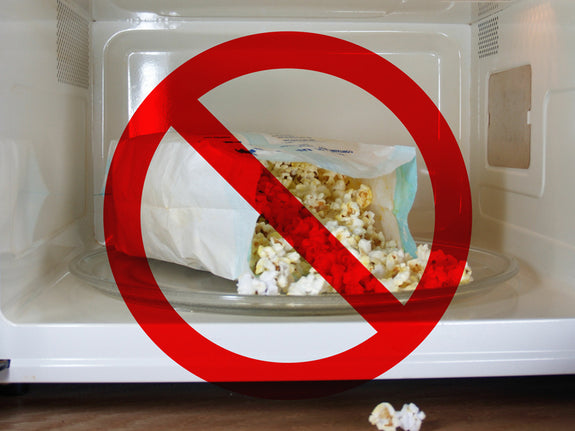 Bag of microwave popcorn with a slash going through it