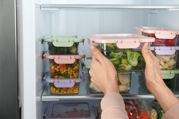 Putting prepped food in the refrigerator