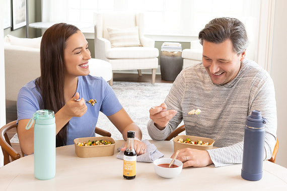 A couple eating at a table