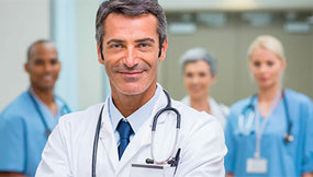 Doctor in front of other doctors