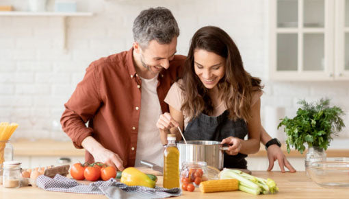 a couple cooking together