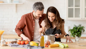 a couple cooking together