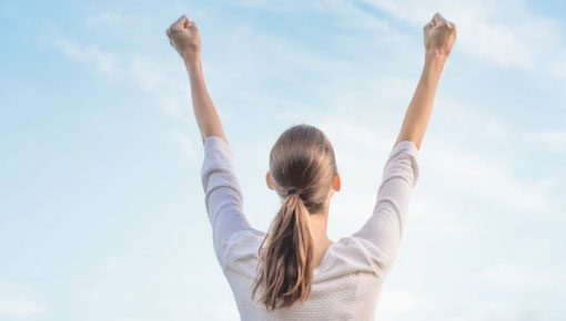 triumphant woman